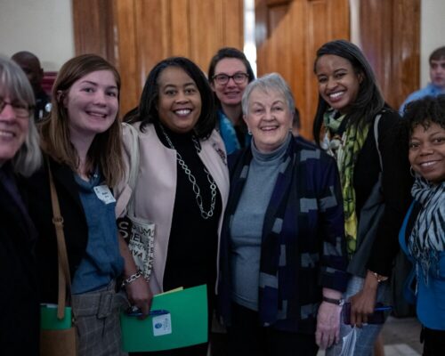 A group of ladies smiling at the camera