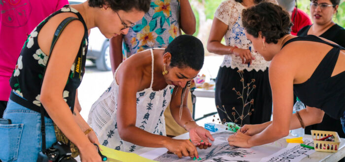 Women working around table