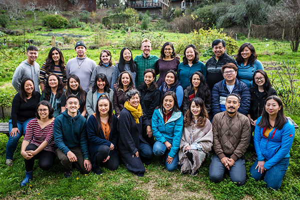 A group of Asian American and Pacific Islanders working together