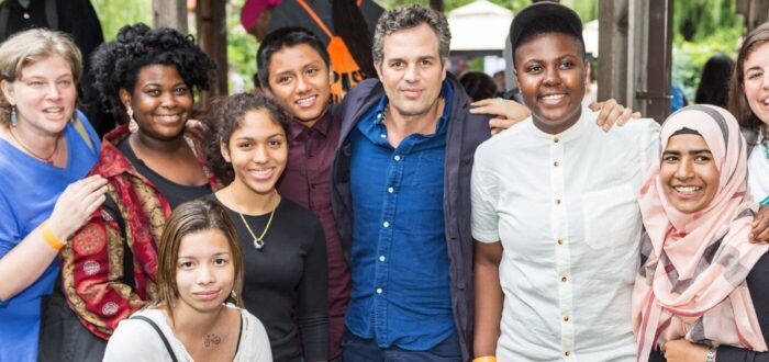 Mark Ruffalo with a diverse group of youth
