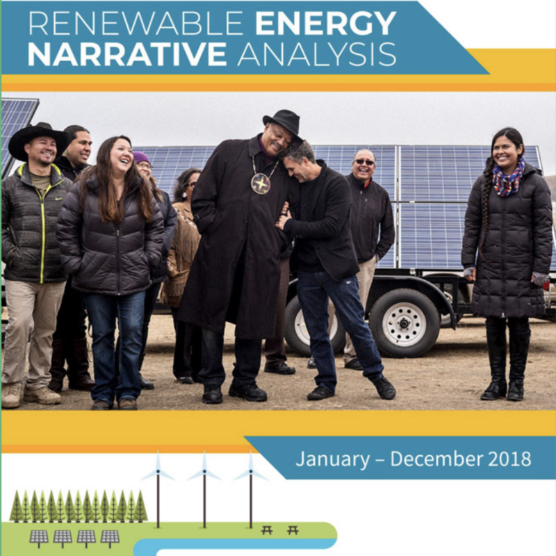 2018 renewable energy narrative analysis with group of people smiling in front of solar panels