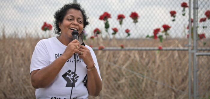 Woman speaking on microphone