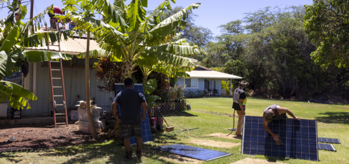 Earth Day blog post header page, Hawaii natives installing solar panels