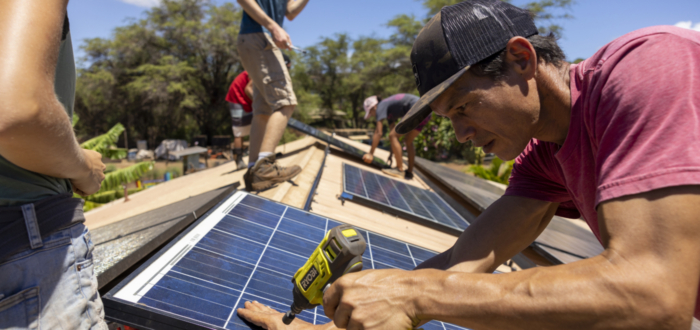 Ho'ahu Energy co-op in Hawaii installing solar panels